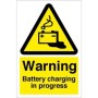 Warning Battery Charging In Progress Sign with yellow and black battery hazard symbol