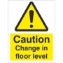 Caution Change In Floor Level warning safety sign with yellow hazard symbol