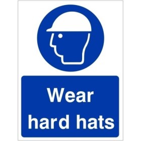 Wear Hard Hats mandatory safety sign with white helmet symbol on blue background