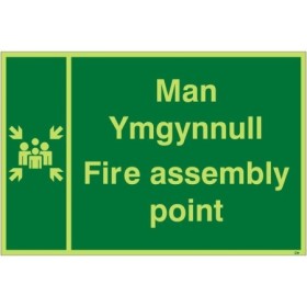 Glow in the dark fire assembly point sign in Welsh and English