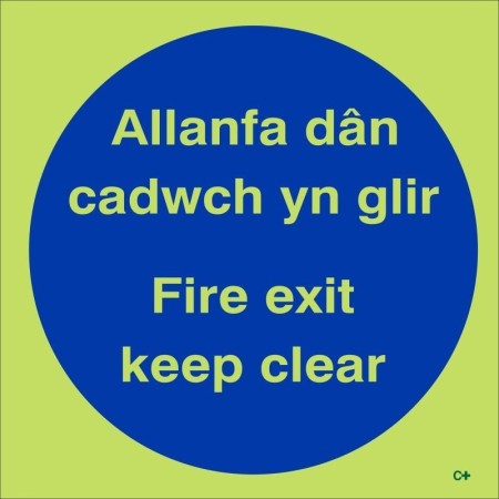 Glow in the dark Fire Exit Keep Clear door sign in Welsh and English