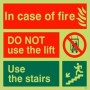 Glow in the dark in case of fire do not use the lift use the stairs sign