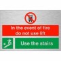 Brushed aluminum In the event of fire do not use lift use stairs down left safety sign