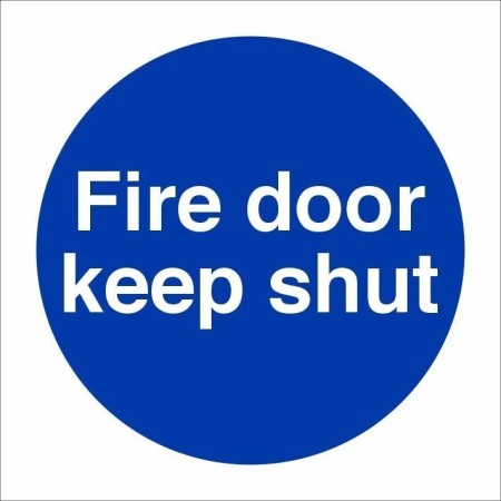 Fire Door Keep Shut mandatory sign with white text on a blue circular background