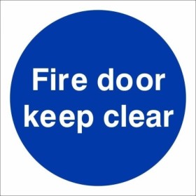 Fire Door Keep Clear mandatory sign with white text on a blue circular background