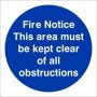 Fire Notice This Area Must Be Kept Clear Of All Obstructions mandatory sign with white text on a blue circular background