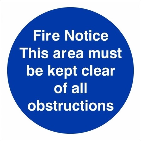 Fire Notice This Area Must Be Kept Clear Of All Obstructions mandatory sign with white text on a blue circular background