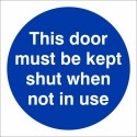 This Door Must Be Kept Shut When Not In Use mandatory door sign with white text on a blue circular background